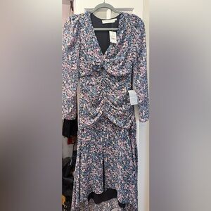 NWT high low ASTR the label purple multi floral dress with a front slit.